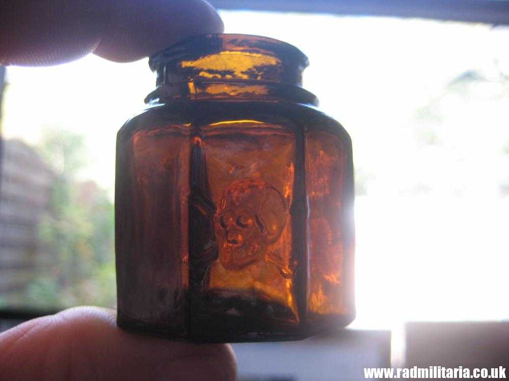 & unknown old brown color GLASS BOTTLE with SKULL - metal detecting find. - Image 13
