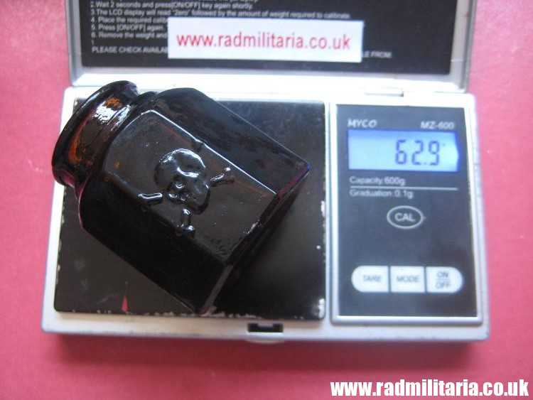 & unknown old brown color GLASS BOTTLE with SKULL - metal detecting find. - Image 17