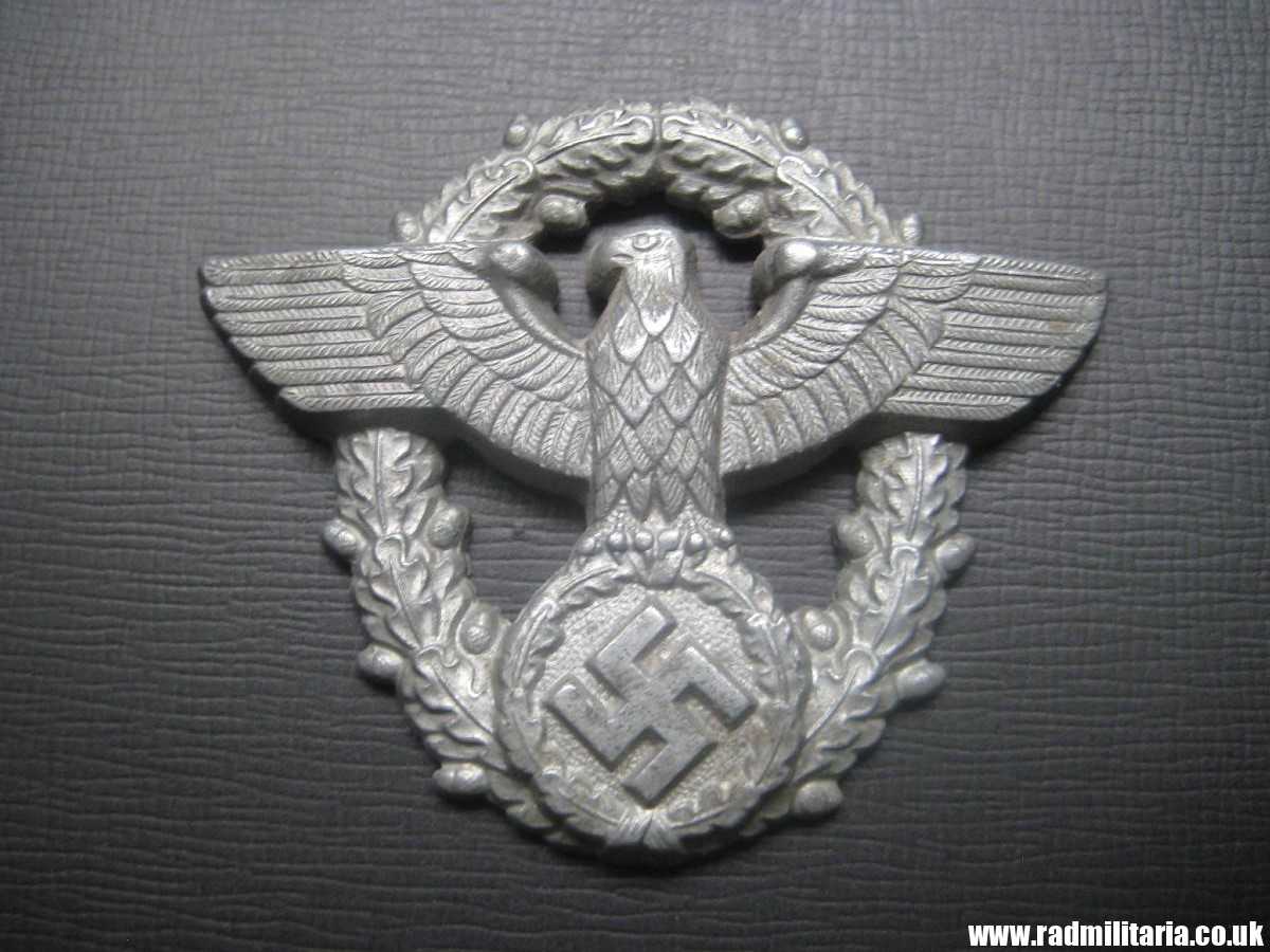 & WW2 original German EAGLE BADGE - zinc cap badge - GENDARMERIE.