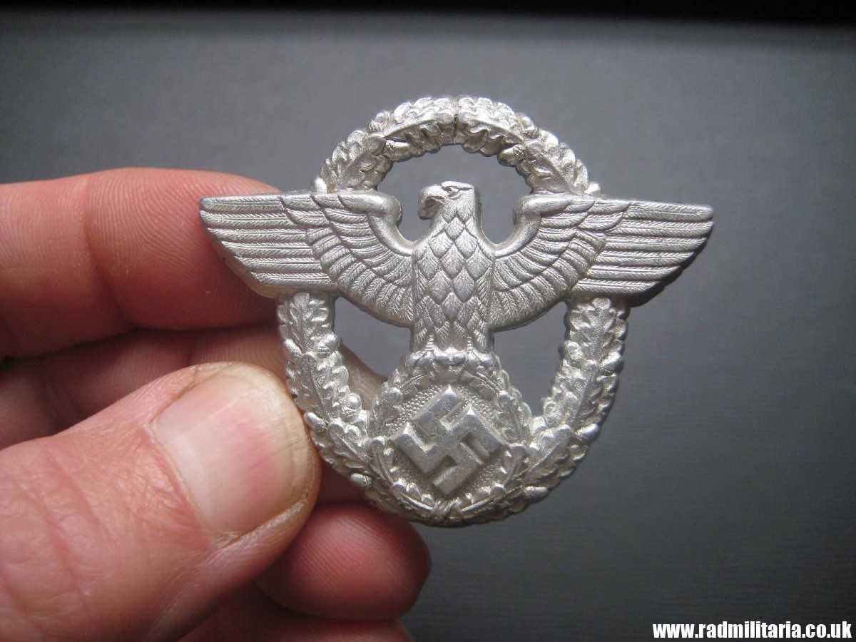 & WW2 original German EAGLE BADGE - CAP BADGE with maker marks: "C.T.D." - GENDARMERIE. - Image 2