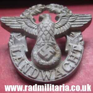 & WW2 original German EAGLE BADGE - zinc GENDARMERIE cap badge "LANDWACHT"