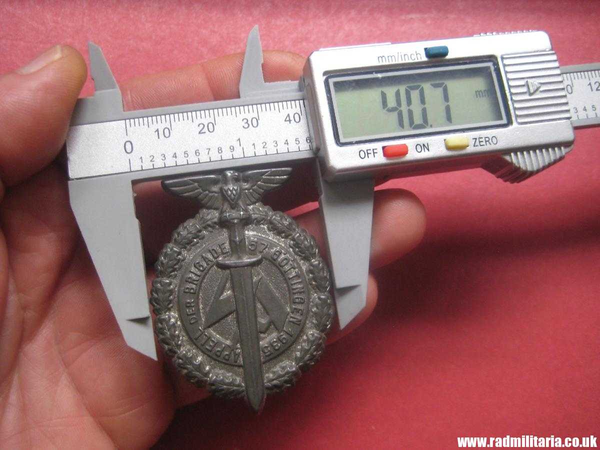 & German large size NSDAP Tinnie BADGE: SA Brigade 57 Gottingen rally badge. - Image 7