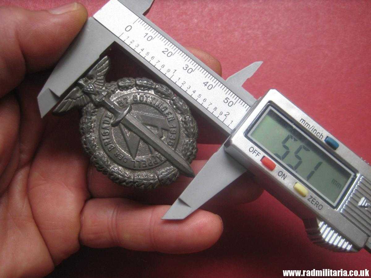 & German large size NSDAP Tinnie BADGE: SA Brigade 57 Gottingen rally badge. - Image 8