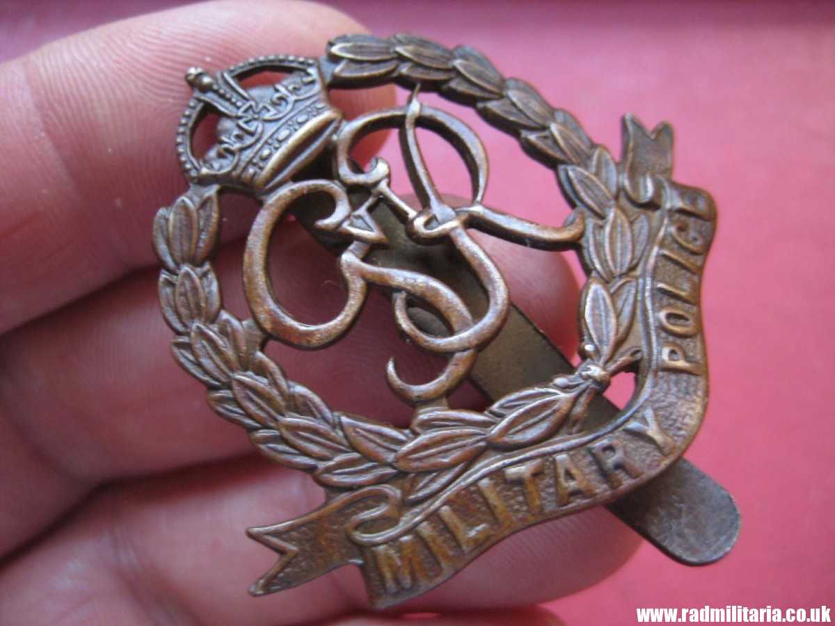 & WW2 original British Royal MILITARY POLICE Corps CAP BADGE in good used condition.