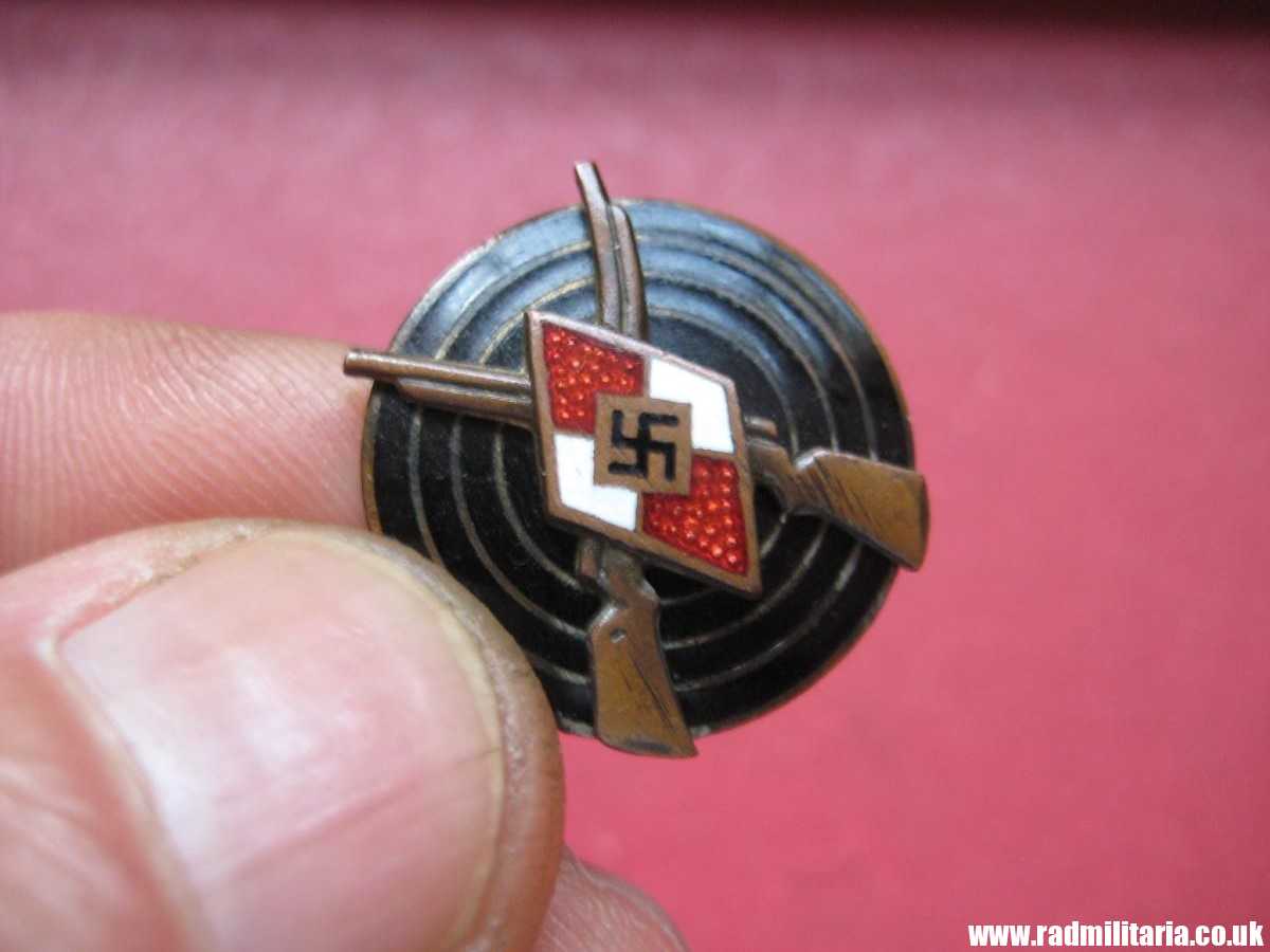 & original HJ SHOOTING namel BADGE - maker marks: RZM M1/25 in good condition.