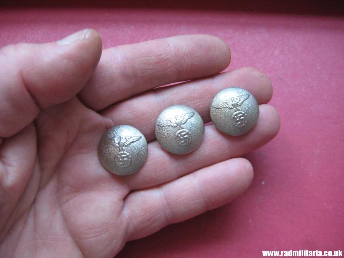 & SET of 3 NSDAP BUTTONS made of white metal in perfect condition.