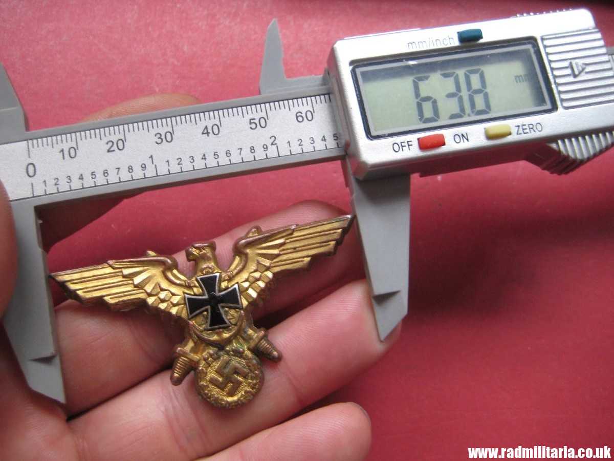 & original German KRIEGSMARINE EAGLE BADGE - gilded BADGE marked: GES. GESCH. - Image 17