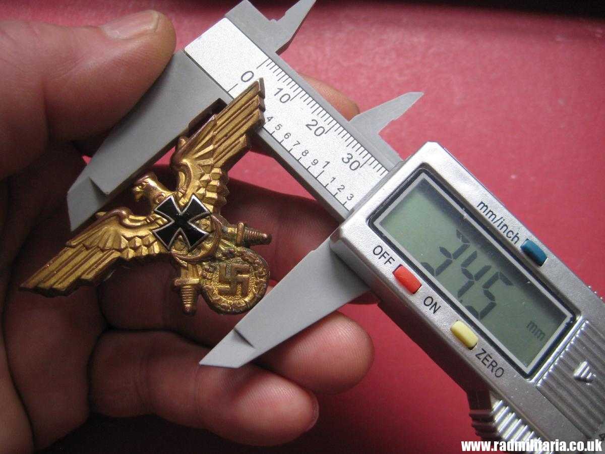 & original German KRIEGSMARINE EAGLE BADGE - gilded BADGE marked: GES. GESCH. - Image 16