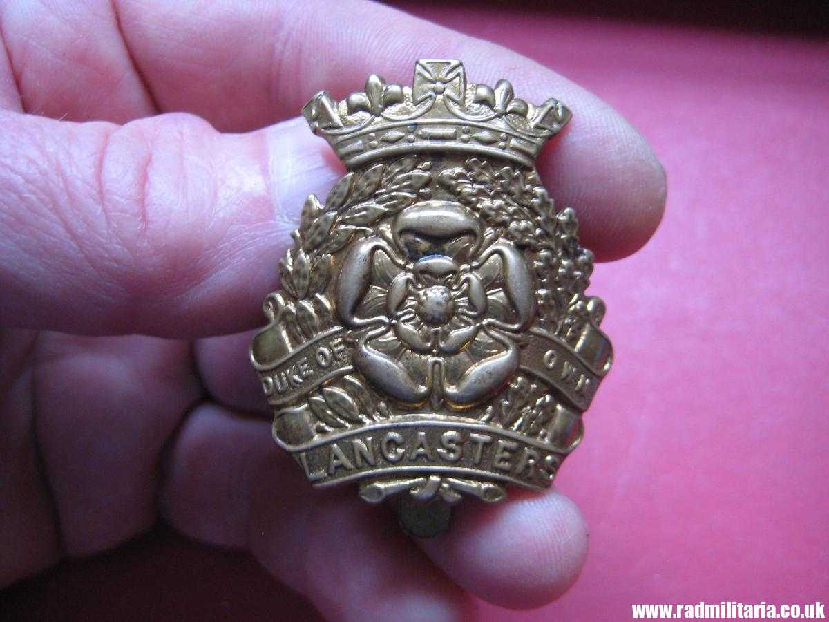 & WW2 British Army CAP BADGE - Duke of Lancasters Own Yeomanry BADGE owners name: HESTER.