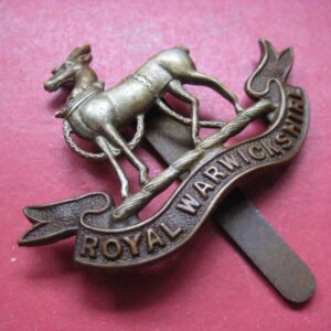 & WW1 British CAP BADGE: Royal Warwickshire Regiment.